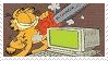 Garfield the cartoon cat gleefully attacking a computer monitor with a chainsaw.