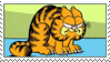 Garfield the cartoon cat hunched up angrily with his ears back.